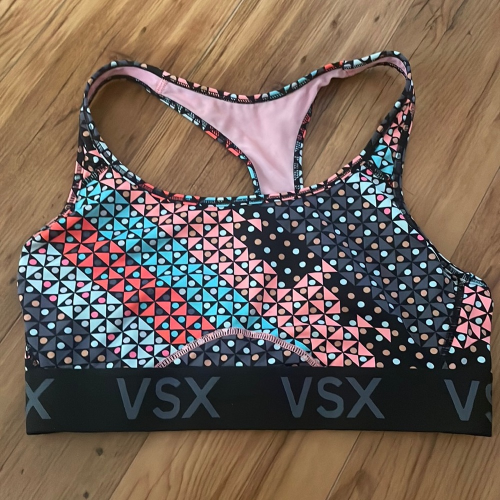 Vintage Victoria Secret Sports Bra size Medium. Multi-colored fits well.